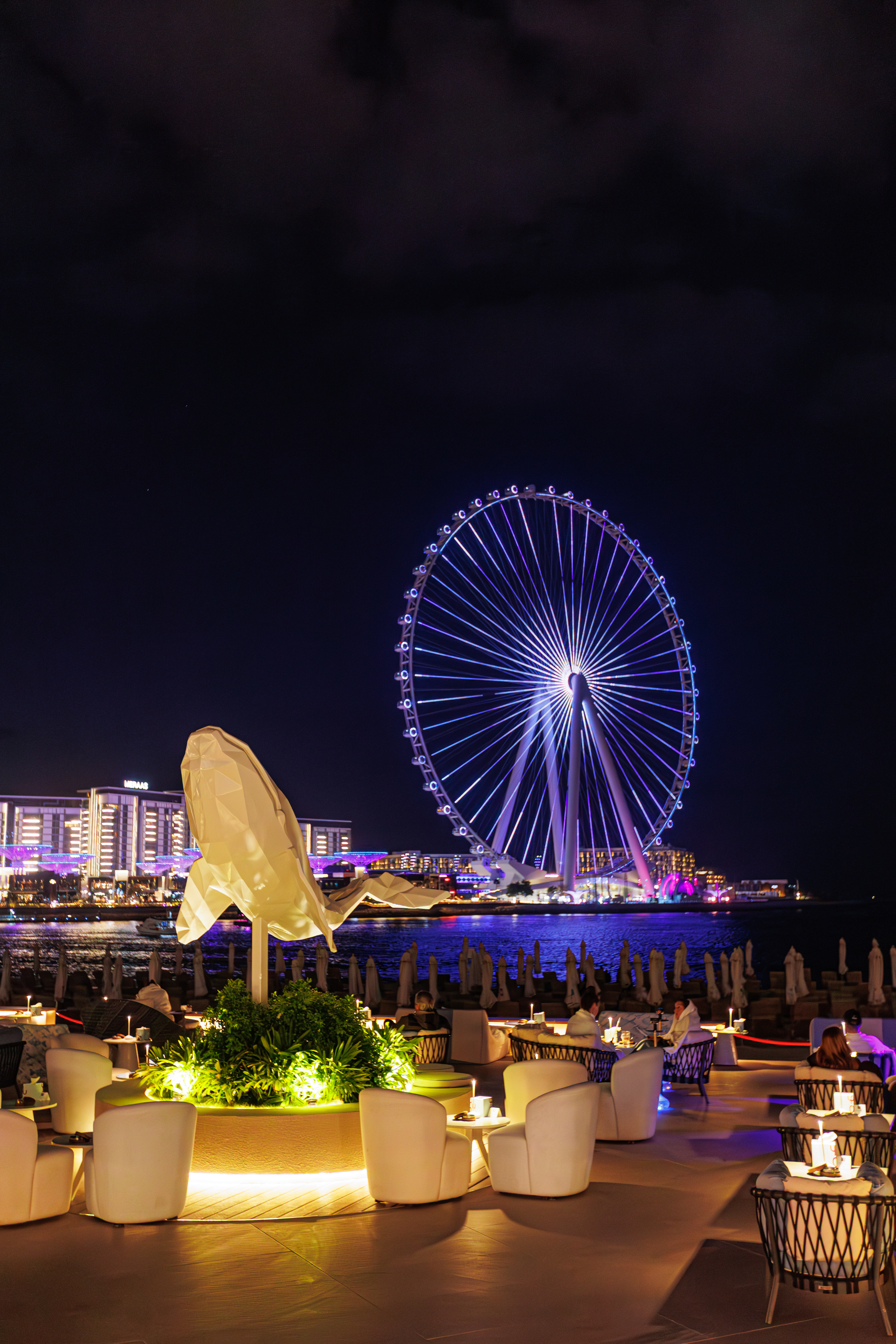 Yula Lounge beach club terrace with Dubai skyline